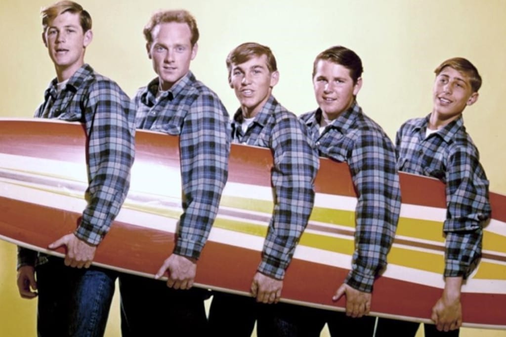 Beach Boys With A Surfboard